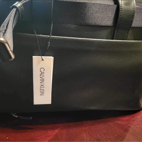 Calvin Klein Small Leather Duffle Bag - Picture 4 of 9